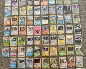 pokemon card collection sale Sell Us Your Cards Larger Than Life Toys and Comics Pokemon Trading Card Game