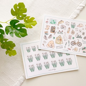 Hoja de pegatinas con dibujos y flores