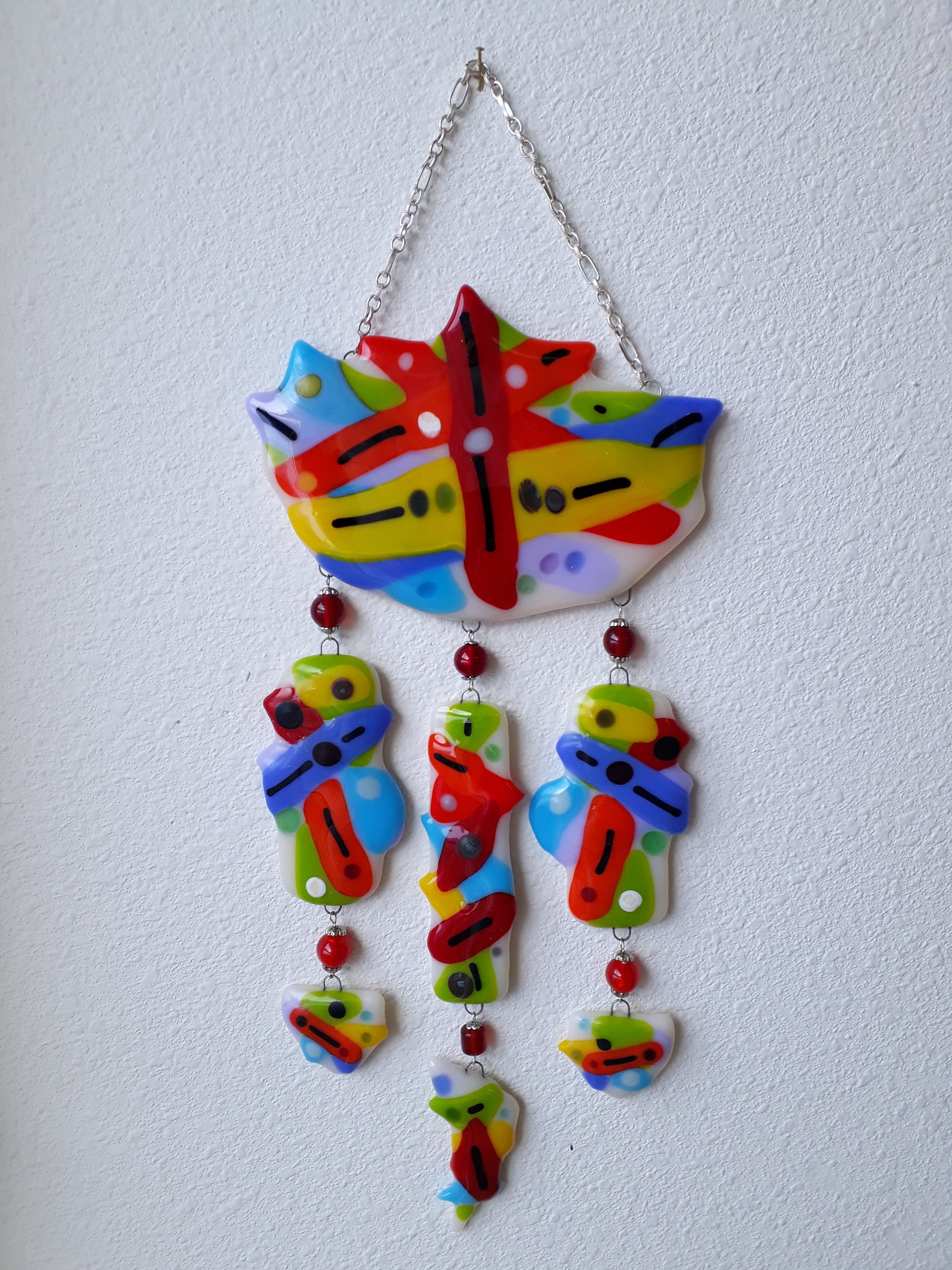 Bright and colorful fused glass wall hanging. Etsy