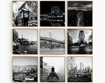 May include: A grid of nine square black and white photographic prints featuring various city landmarks and landscapes, including a steam clock, a suspension bridge, a lighthouse, a harbour, and urban architecture, all framed in thin wooden borders.
