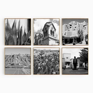 May include: A set of six square black and white photographs in thin gold frames. The images depict an agave plant, a historic church, an adobe building, a mountain landscape with a water tower, a cactus, and a statue in front of a building.