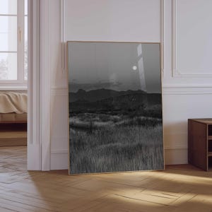 May include: A set of three ceramic mugs with a speckled, matte finish. The mugs are in shades of cream, light gray, and dark gray. Each mug has a simple, minimalist design, perfect for coffee or tea.