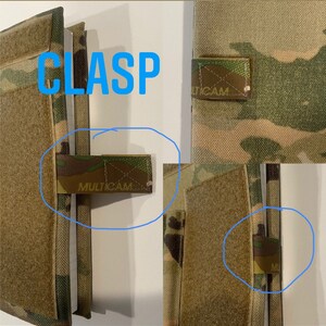 May include: A brown and green camouflage fabric with the word "MULTICAM" printed on a brown strap. The fabric is attached to a white surface with the word "CLASP" printed in blue.