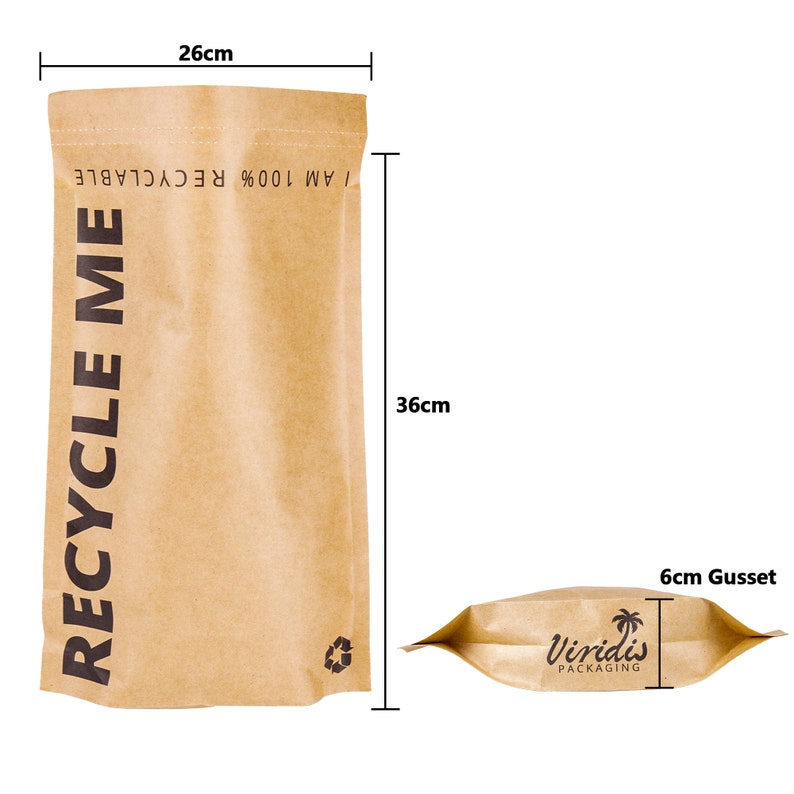 May include: A brown paper bag with a gusset, measuring 26 inches wide and 36 inches tall. The bag is made of 100% recyclable material and has the text "I AM 100% RECYCLABLE RECYCLE ME" printed on the front. The bag is made by Viridis Packaging.