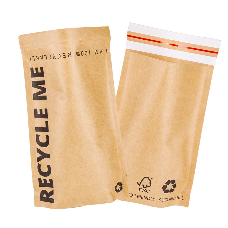 May include: Two brown paper mailing envelopes with a red stripe across the top. The envelope on the left has the text "RECYCLE ME I AM 100% RECYCLABLE" printed on the front. The envelope on the right has the text "FSC ECO-FRIENDLY SUSTAINABLE" printed on the bottom.
