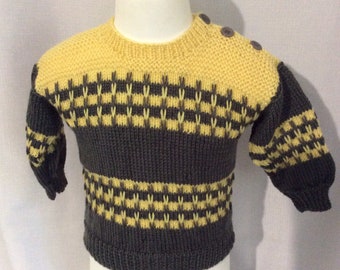 Children’s hand knitted jumper