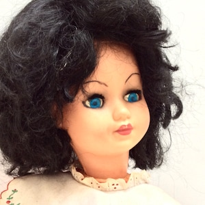 Vintage large black hair female doll adult young girl 1970s hard plastic blue eyes white shoes in red dress white collar sleepy eyes