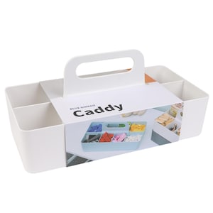 May include: White plastic caddy with a handle and multiple compartments. The caddy is labeled "Blue Ginkgo Caddy".
