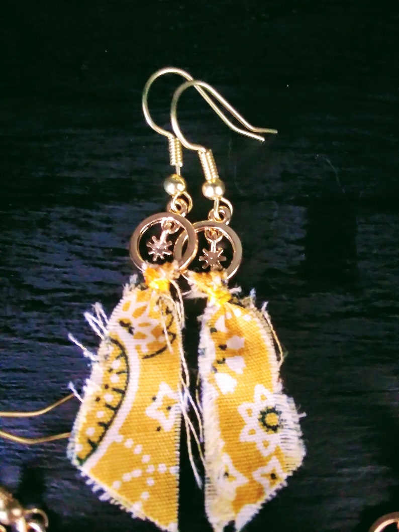 red earrings gold blue has moons and yellow earrings Bandanna earrings blue yellow has sun/'s and red has stars handkerchief earrings
