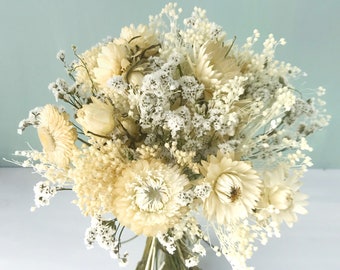 Bouquet of natural dried flowers with ecru helichrysum and limonium, country decoration, wedding bouquet dried flowers