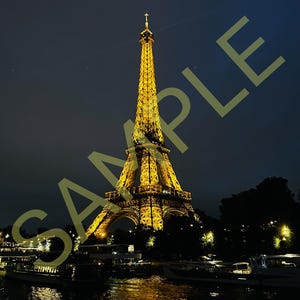The Eiffel Tower At Night