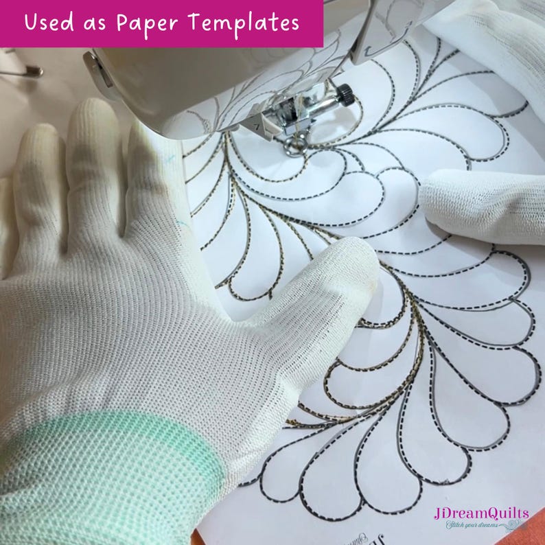 May include: A sewing machine is shown stitching a decorative design onto white fabric. The text "Used as Paper Templates" is visible. A white glove is on the fabric, and the design is a feather-like pattern. The image is from JDreamQuilts.
