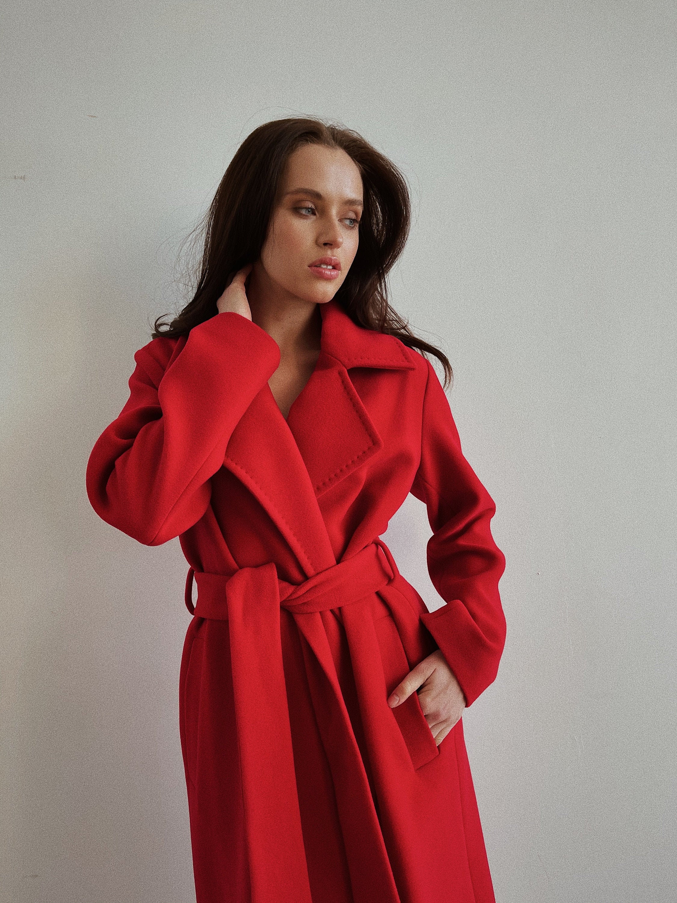 red belted wrap coat