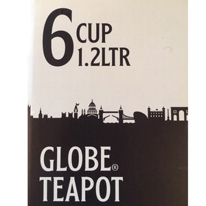 Puede incluir: Imagen en blanco y negro del horizonte de Londres con el texto "6 cup 1.2 LTR GLOBE TEAPOT" debajo.
