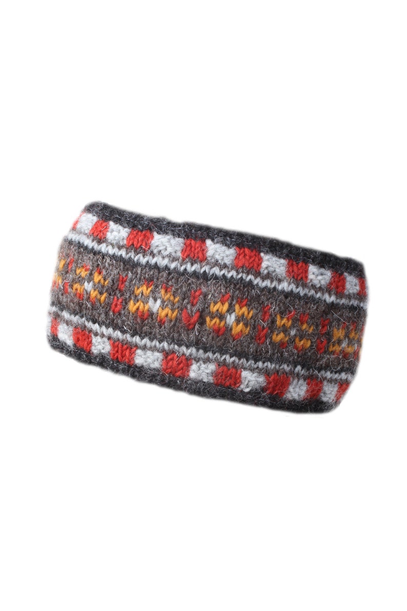 May include: A gray, red, and white knitted headband with a geometric pattern.