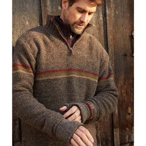 Men's Half Zip, 100% Wool Hand Made. 3 colour grey Chest Stripes. Side pockets. Reverse Knit 1ply Wool. Fully Fleece Lined.