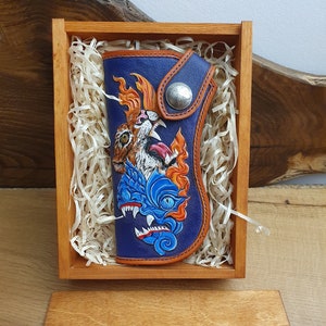 oriental tooled long leather wallet
