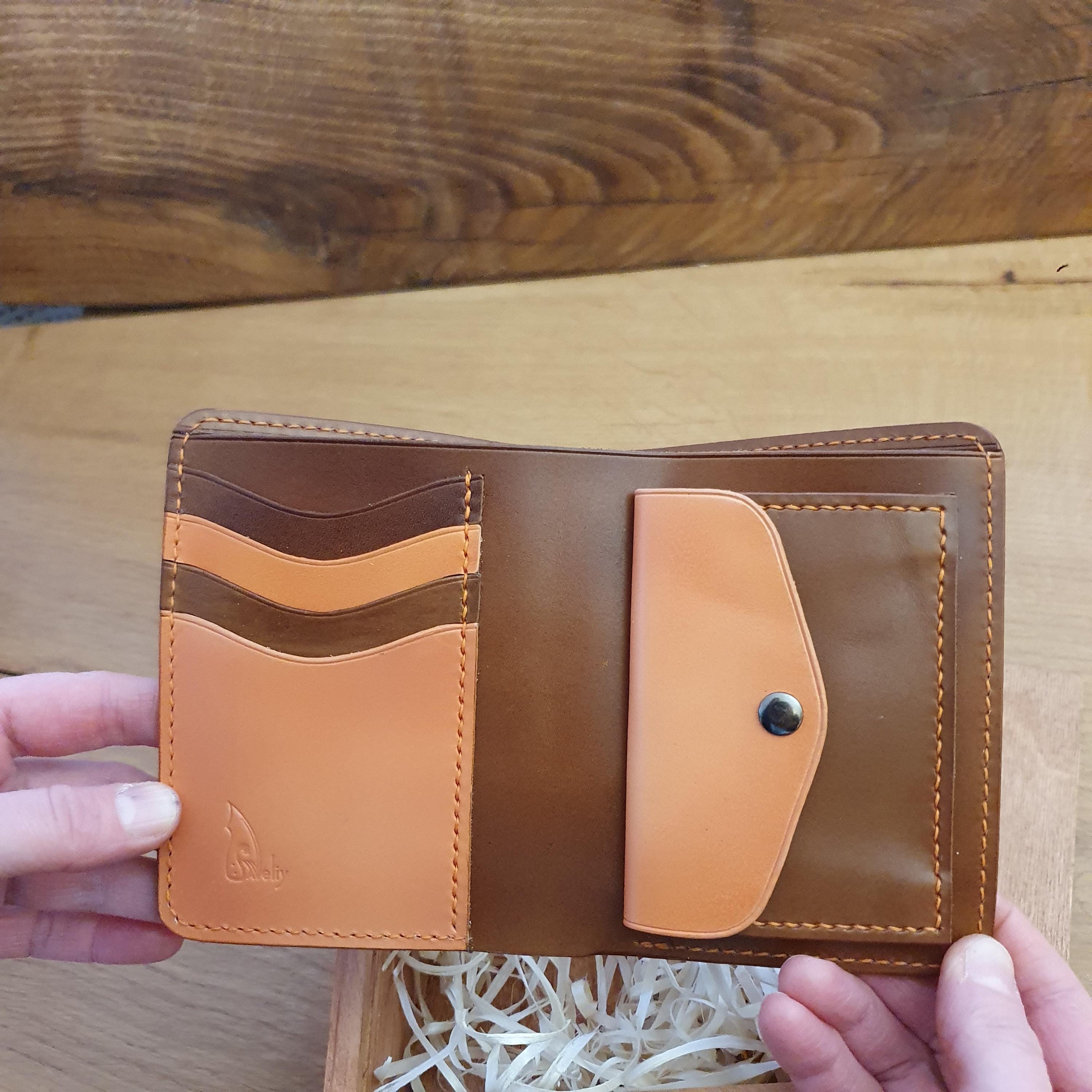 Carteras de león de piel