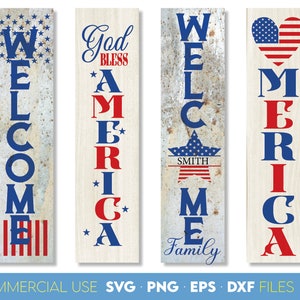 May include: Four vertical wooden signs with patriotic themes. The signs feature the words "WELCOME" and "AMERICA" in red and blue, along with stars and stripes designs. One sign has a heart-shaped American flag.