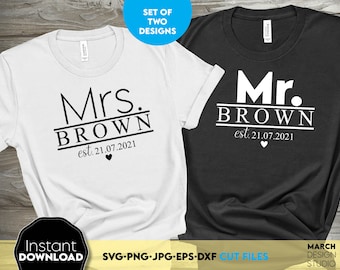 May include: Two white t-shirts with black text. One shirt says "Mrs. Brown est. 21.07.2021" and the other says "Mr. Brown est. 21.07.2021".