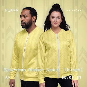 May include: A light yellow bomber jacket featuring a subtle vertical chevron pattern and a central white zipper. The garment includes long sleeves with ribbed cuffs and a ribbed collar. The text Backrooms Bomber Jacket [Unisex] is visible.