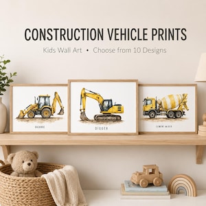 May include: Three framed wall art prints featuring watercolour illustrations of yellow construction vehicles: a backhoe, a digger, and a cement mixer. The text "CONSTRUCTION VEHICLE PRINTS" and "Kids Wall Art • Choose from 10 Designs" appears above the prints.