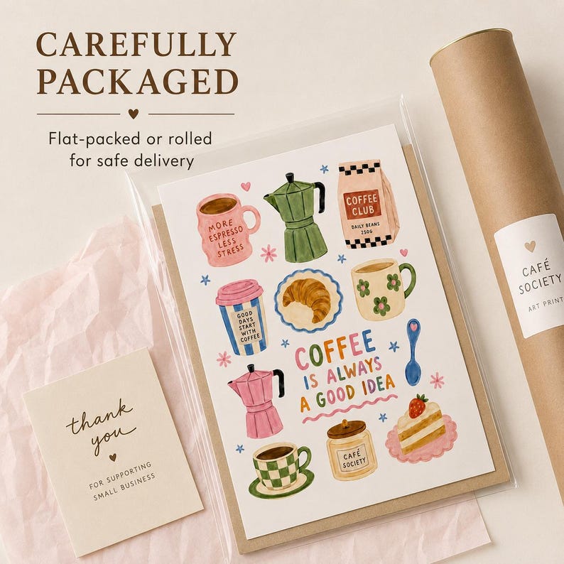 May include: A rectangular art print featuring colorful illustrations of coffee-related items, including mugs, a moka pot, a croissant, and a slice of cake, with the text "COFFEE IS ALWAYS A GOOD IDEA" and a small "thank you" card in a clear sleeve.