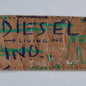 Etichette Diesel vintage. Etichetta Diesel in denim vintage riciclato. Toppa con marchio in denim riciclato.