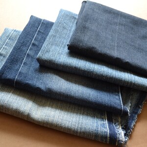 Recycled denim, pieces of denim, jeans fabric , denim fabric