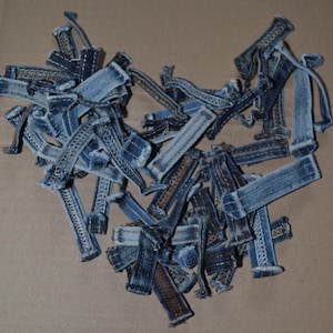 50 pcs. colored denim belt loops, Jeans are redesigned.