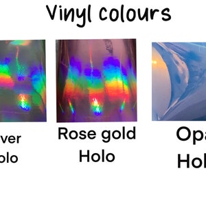 May include: Three samples of holographic vinyl in silver, rose gold, and opal colors. The vinyl is iridescent and reflects light in a rainbow of colors.