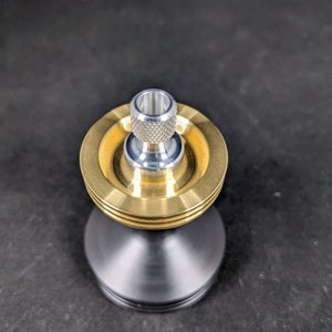 Brass precision spinning top | The Cataract