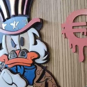 May include: A cartoon duck wearing a red, white, and blue hat with a star on it. The duck is wearing a brown jacket with a Gucci pattern. The duck is holding its hand up to its face. There is a pink euro sign with dripping paint in the background.