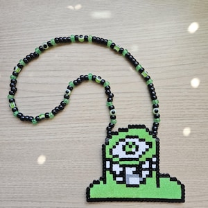Subtronics Logo Cyclops Perler Necklace: Glittery Green