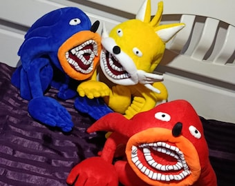 A toothy monster is a soft plush toy, custom-made from a child's drawing. Handmade. 30-40 cm.