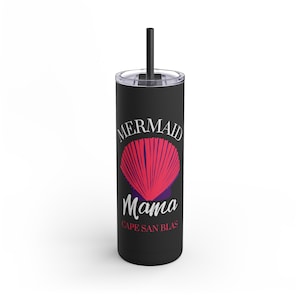 May include: Black stainless steel tumbler with a white graphic of a seashell and the text "Mermaid Mama Cape San Blas".