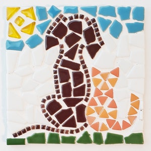 May include: A mosaic tile artwork depicting a brown dog and an orange cat sitting side by side. The dog is on the left and the cat is on the right. The background is white with blue and yellow mosaic tiles.
