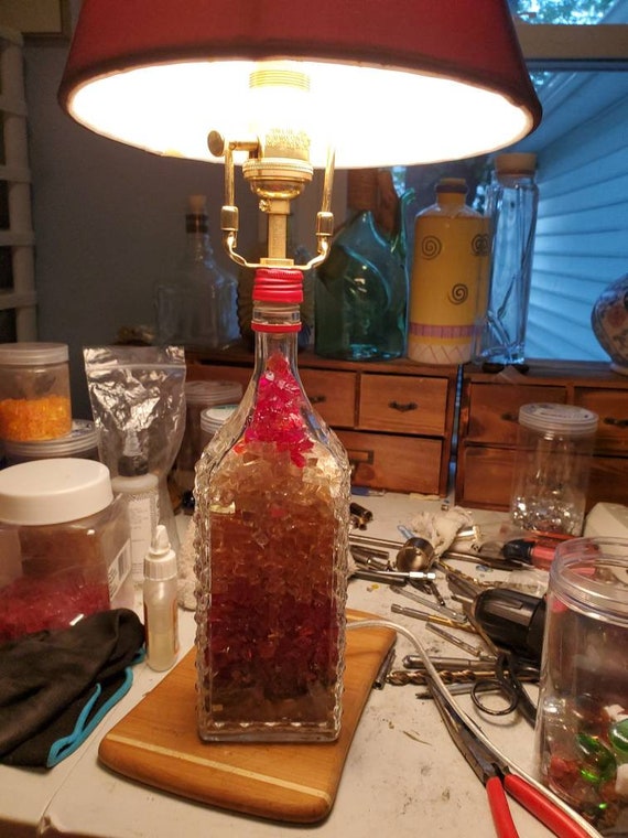 Zwetschgenwasser Bottle Lamp With Multi-color Lava Rocks With Red