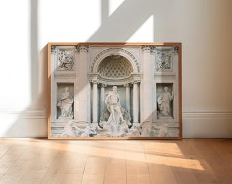 May include: A framed photograph of the Trevi Fountain in Rome, Italy. The fountain is a large, ornate structure with a central statue of Oceanus, the god of the sea. The fountain is surrounded by sculptures of other mythological figures.