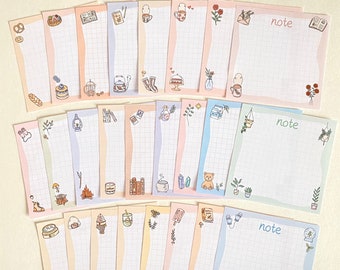 May include: A set of 24 colorful note cards with grid paper and cute illustrations. Each card has a different design, including a teapot, a book, a snow globe, and a campfire. The cards are perfect for taking notes, writing lists, or leaving messages.