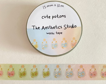 May include: A roll of washi tape with a design of cute potion bottles. The tape is 15 mm wide and 10 m long. The tape is packaged in a clear plastic container with a label that reads "The Aesthetics Studio, cute potions, washi tape".
