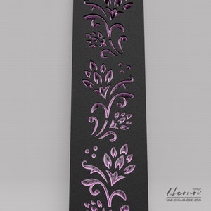 May include: A black and pink floral design with a repeating pattern. The design is cut out of a black background, creating a decorative border.