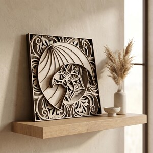 May include: A square, multi-layered wooden wall art piece featuring a laser-cut design of an eagle head profile set against a circular background with intricate, swirling floral patterns and geometric details in shades of light beige and tan.
