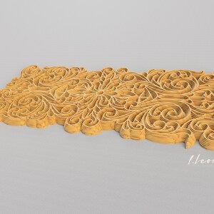 May include: A detailed, intricate, golden paper cut design with a floral pattern. The design is layered and has a 3D effect. The text "I.Leonov Design" is visible in the lower right corner.