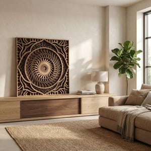 May include: A square wooden wall art piece featuring intricate, multi-layered geometric patterns with a central sunburst design. The artwork is constructed from stacked wood panels in varying shades of brown, creating depth and texture.