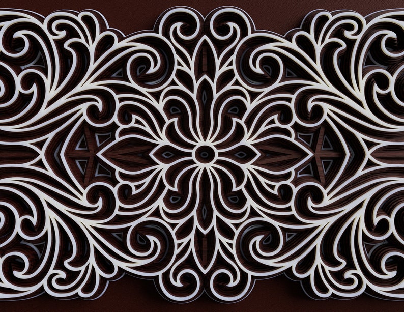 May include: A white paper cutout design with intricate floral patterns layered on top of each other. The design is symmetrical and has a brown background.