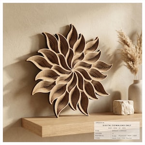 May include: A multi-layered wooden wall art piece featuring a radial, flower-like design with swirling, pointed petals in varying shades of brown. The text on the image indicates a digital download with a size of 200mm x 200mm and 3mm material.