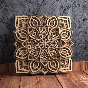 May include: A wooden mandala wall art with intricate geometric patterns and a light brown color.