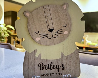 Personalized Wooden Lion Money Box for Children - Custom Engraved name with Money Box written underneath.