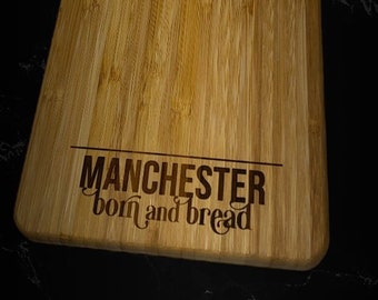 Manchester born and bread chopping board lasered
